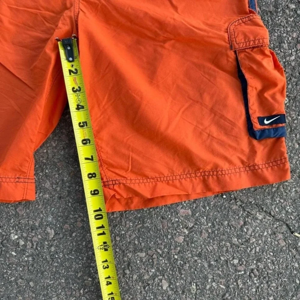 Vintage Nike orange and blue shorts Size L‎